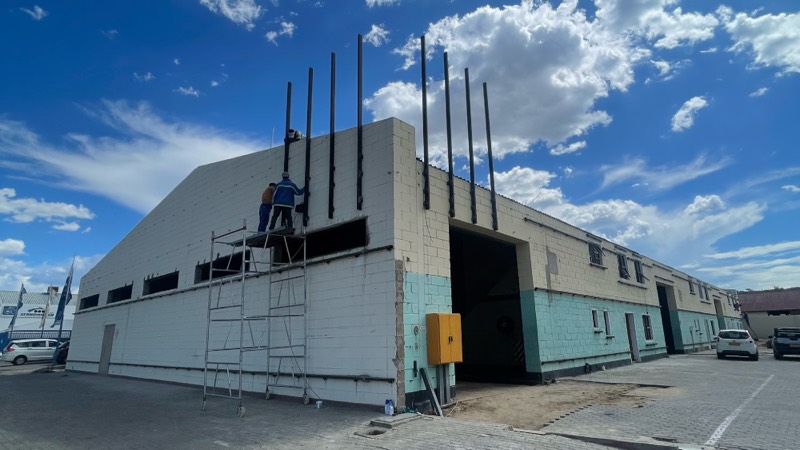 New blockwork and a steel frame rising along the front of the building.
